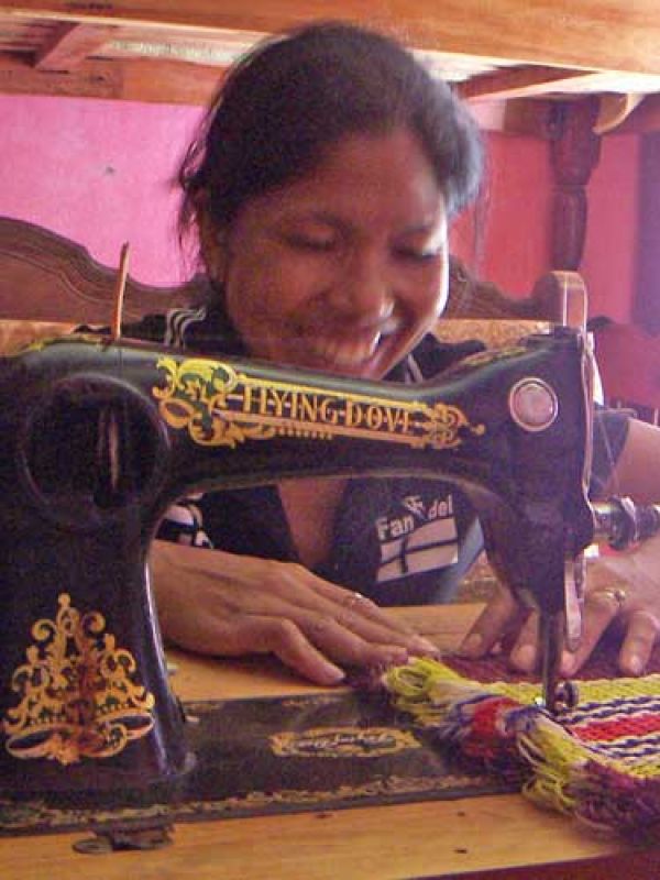 14. In the capital, Mme Hanta and M Mamtiana receive the woven material they ordered. They use woven sisal to the outside of the baskets, plaited sedges to the inside and bottom of the baskets. Woven raffia leaf leaves are used to the outside of the bottom.