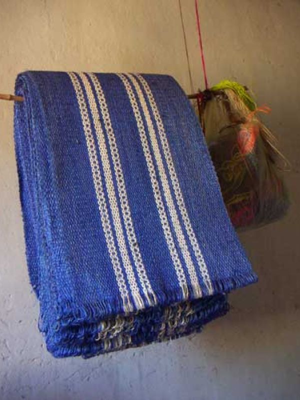 13. Woven sisal, ready for delivery. There is no road to Antapiabe for motor driven vehicles. M Solo loads the woven sisal on his bicycle some 4km, where a tarmac road passes.